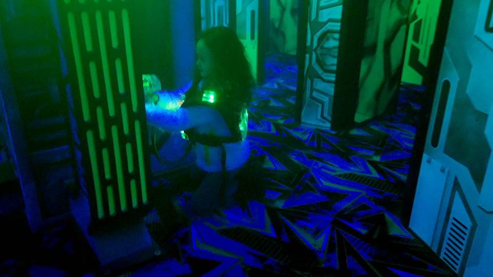 Players with laser tag phasers